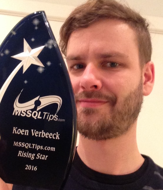 Koen Verbeeck proudly holding his 2016 MSSQLTips.c